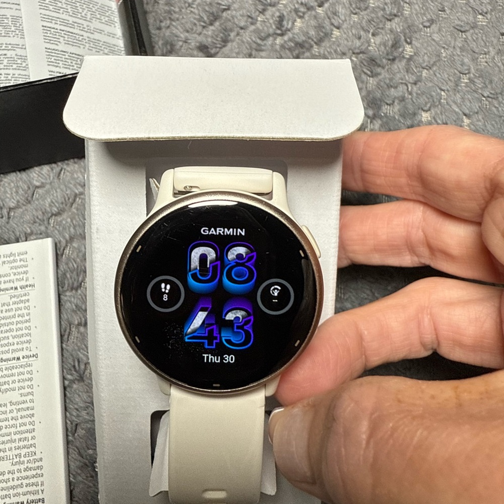 garmin smartwatch white with black display bezel